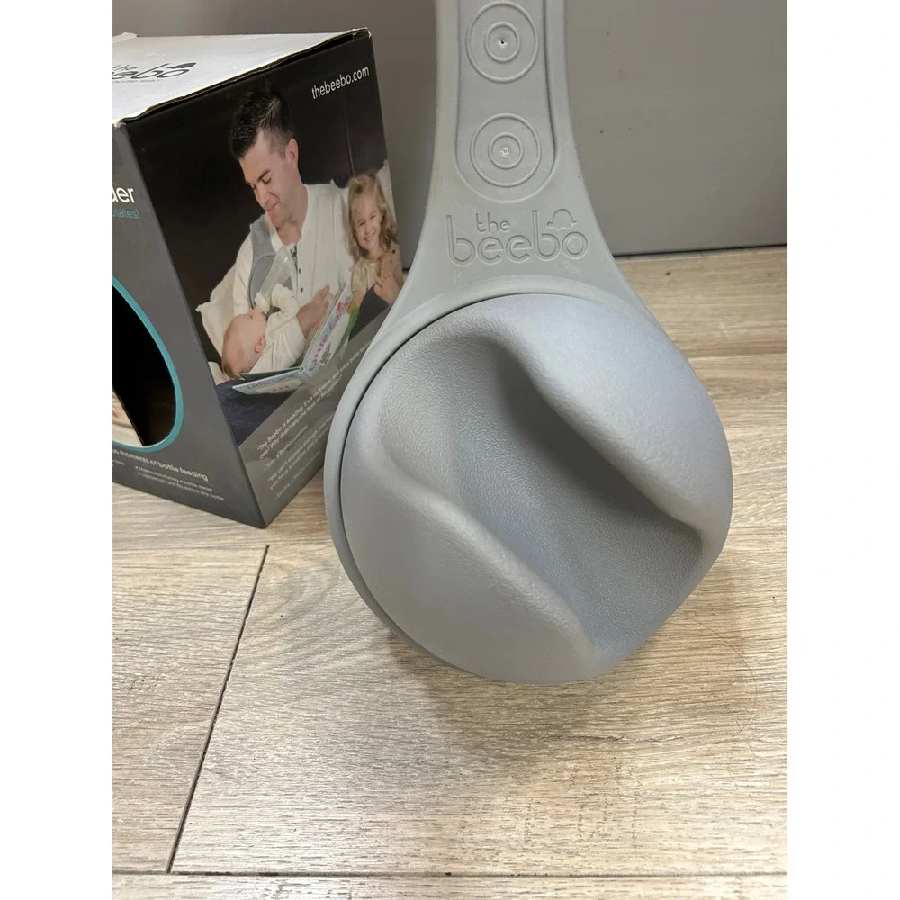 The Beebo Hands Free Bottle Holder Charcoal Gray Baby Feeding Accessory Rotating